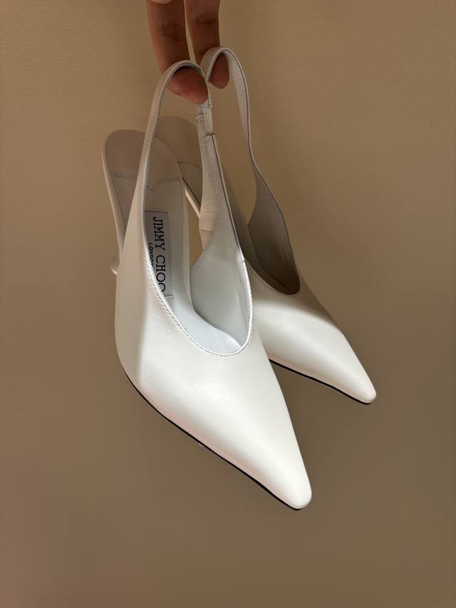 Jimmy Choo Classic Back-Open Design With Elastic Heel. The Shoe Shape Is Very El