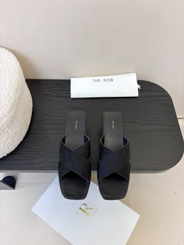 The Row Thick-Soled Cross-Strap Slippers At First Glance, These Shoes Appear Sim