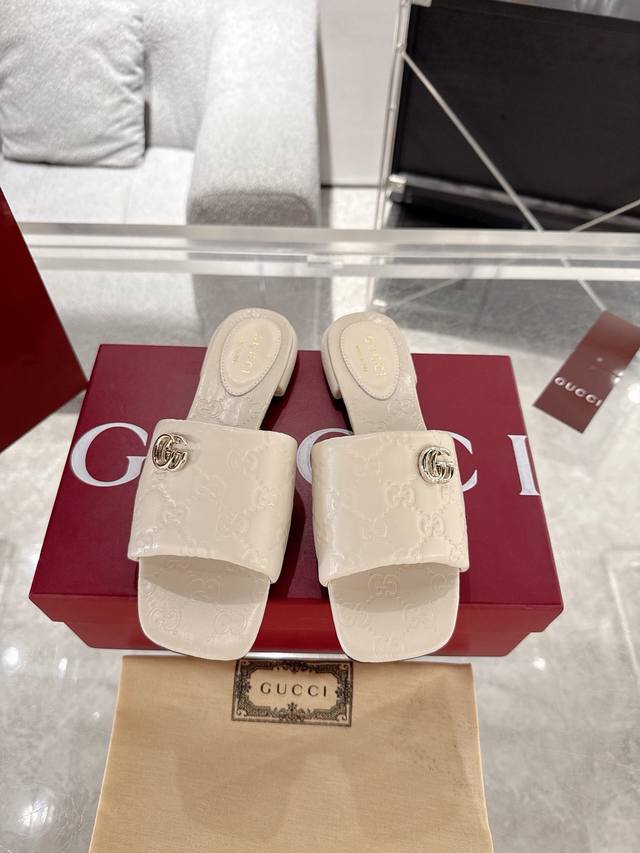 Women's Double G Embossed Slippers This Statement Shoe Is Crafted From Premium G