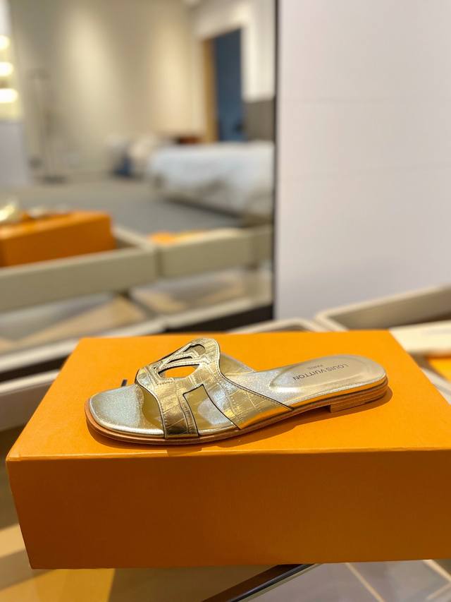 Price: Louis Vuitton Louis Vuitton This Lv Isola Flat Sandal Is Made Of Soft Cow