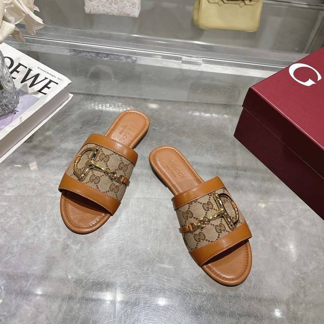 8023-1 Brown G 35-43 These Women's Slides Are Enhanced With Gold-Tone Hardware A