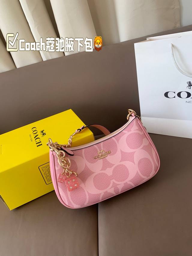 Soft Matte Pink Coach's Hottest Underarm Bag Is Here The Hottest Underarm Bag In