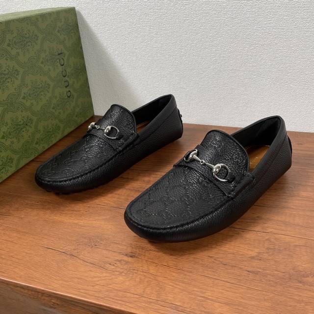 Gucci Men's Slip-On Driving Shoes With Horse Bit Buckle. The Horse Bit Buckle, A