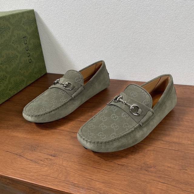 Gucci Men's Slip-On Driving Shoes With Horse Bit Buckle. The Horse Bit Buckle, A