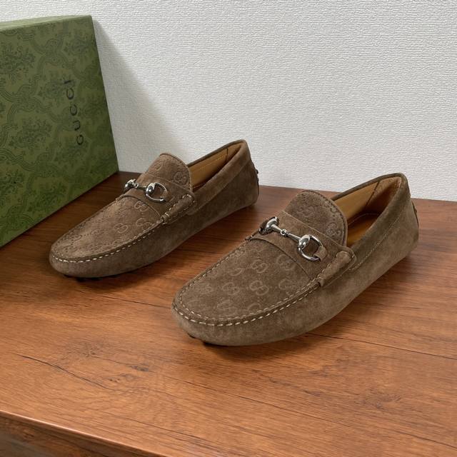 Gucci Men's Slip-On Driving Shoes With Horse Bit Buckle. The Horse Bit Buckle, A