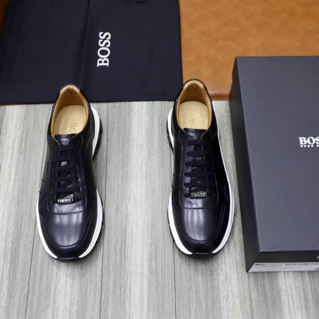 Boss New Men's Leather Casual Sneakers. This Sneaker Features A Simple Silhouett