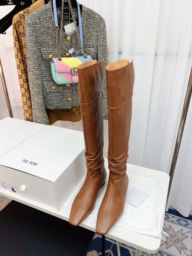 The Row Minimalist Chelsea Boots With Retro Pleats And High Heels. As Always, Th