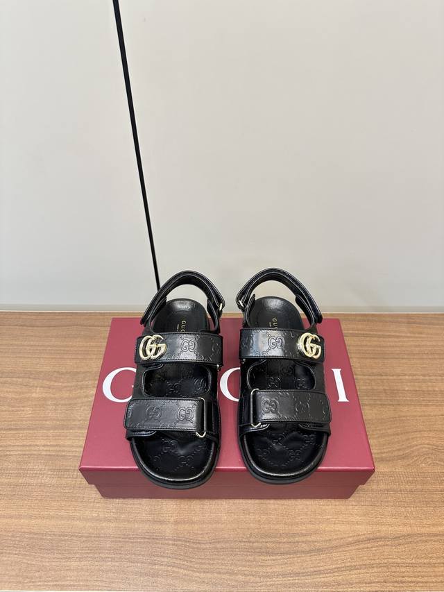 Gucci | Gucci Women's Double G Buckle Embossed Velcro Beach Sandals. These Sanda