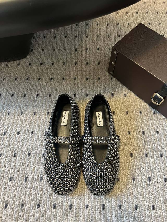 Exclusive New Arrival Alaia 25 Runway-Inspired Flat Glass Diamond Ballet Flats.