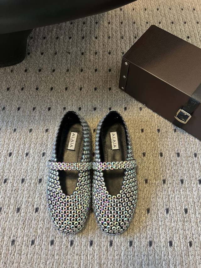Exclusive New Arrival Alaia 25 Runway-Inspired Flat Glass Bead Ballet Flats. Ala