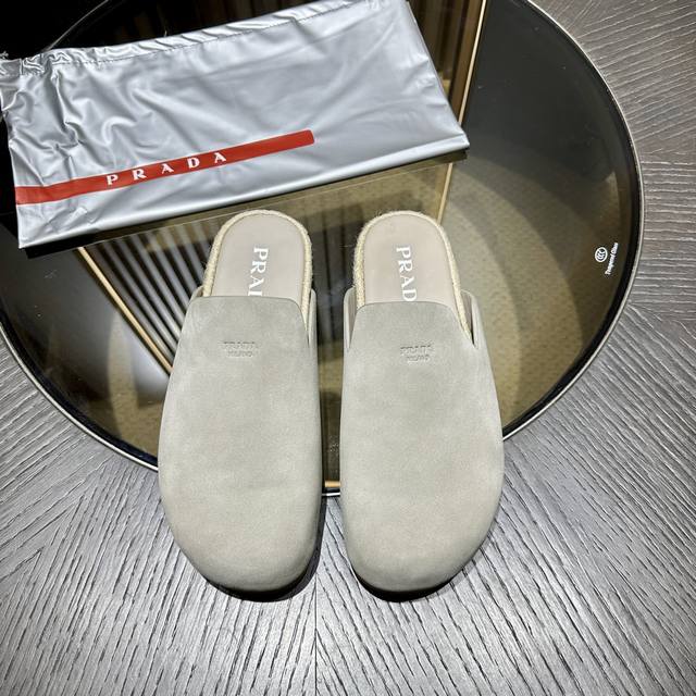 prada This Stylish And Casual Mule Cleverly Combines Refined Texture With The