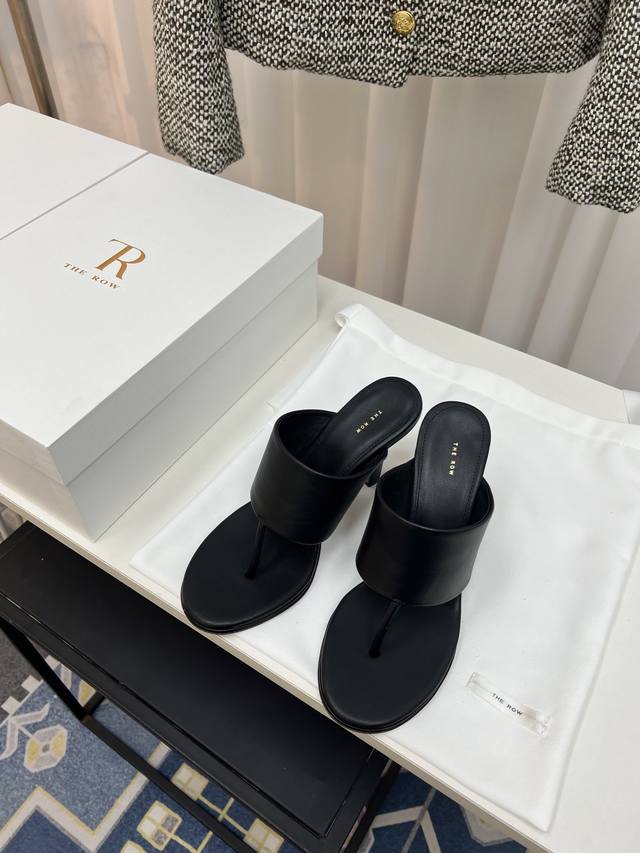 the Row Flat Slippers, Flip Flops, High Heel Slippers A Pair Of Slippers That