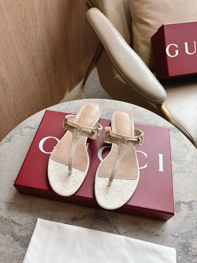 5760-2 White P 35-42 This Women's Thong Sandal Features Classic Horsebit Deta