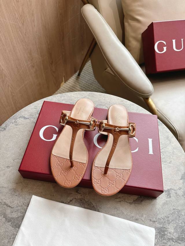 5760-2 Brown P 35-42 This Women's Thong Sandal Features Classic Horsebit Deta