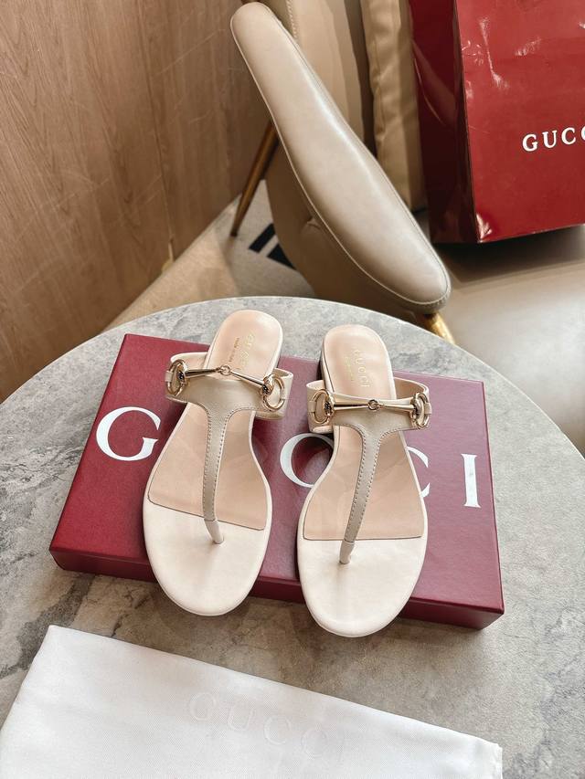 5760-1 White P 35-42 This Women's Thong Sandal Features Classic Horsebit Deta