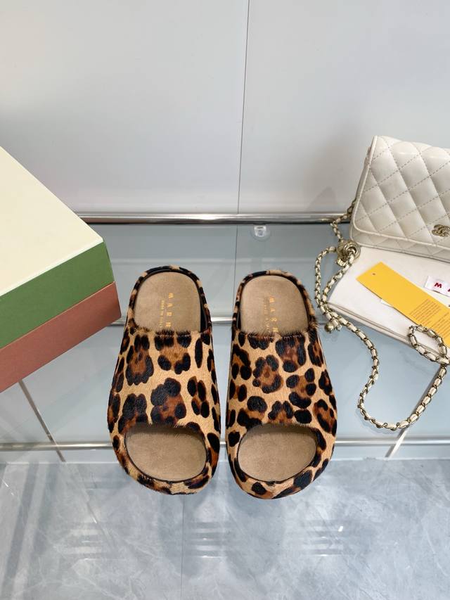 p Female P Male P Marni's New Banana Slippers With Hand-Sewn Logo On The Uppe