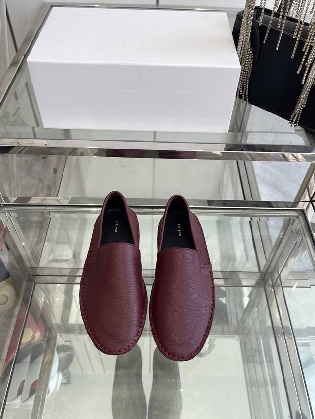 the Row Genuine Leather Minimalist Slip-On Loafers . The Wrapping Craftsmansh