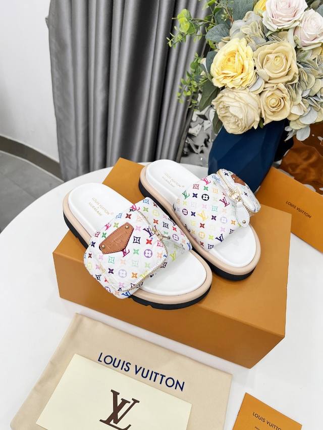 louis Vuitton's Popular Embossed Logo Sandals. This Pool Pillow Comfort Flat