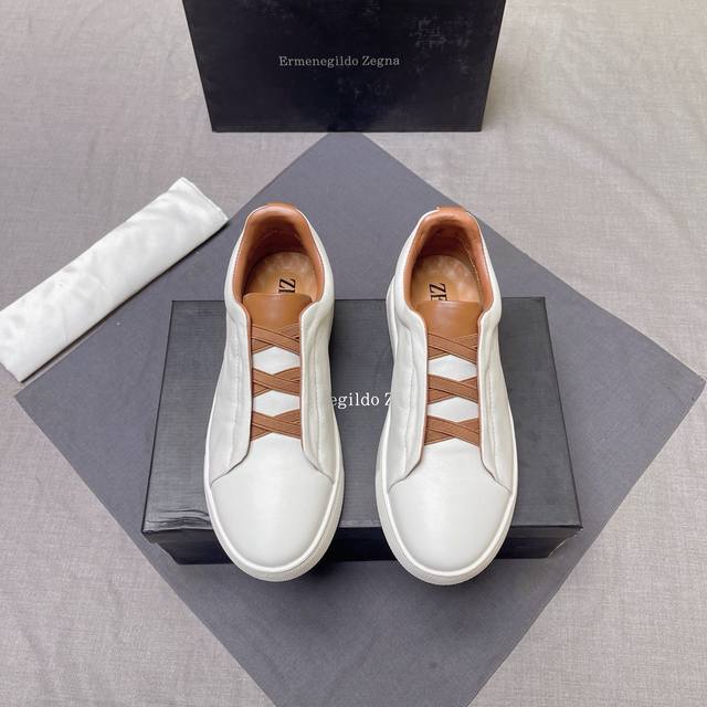Fashionable Ermenegildo Zegna men's casual shoes. Imported canvas upper, cross-e