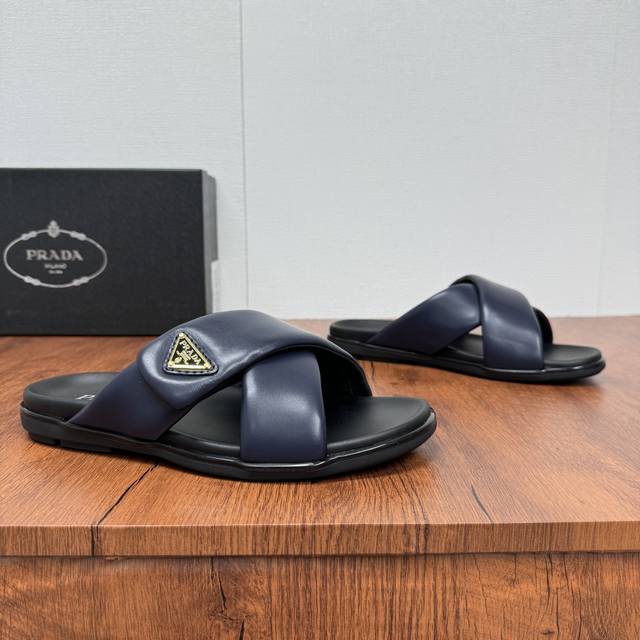 Prada's new men's leather cross slippers with Velcro closure for fine-tuning the
