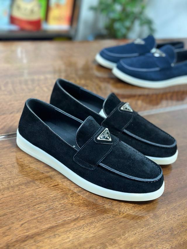 Pra****Pra**Loafers These sophisticated slippers are a simple and versatile expr