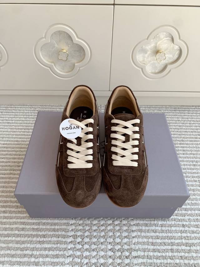 batch of women and men purchasing-level Hogan couple's Forrest Gump shoes Hogan