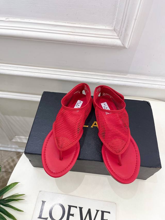 Alaa Alaa 25Ss new spring and summer flat fishnet flip-flop sandals Alaa is the