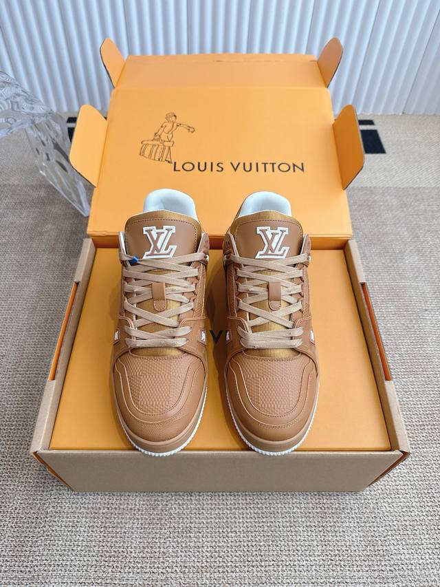 Louis Vuitton Trainer sneaker This Lv Trainer sneaker combines Monogram denim an