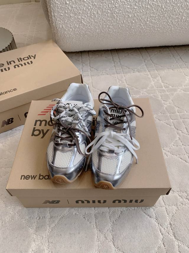 Suede leather surface Miu X Newbalance collaboration sneakers. The shoes are so