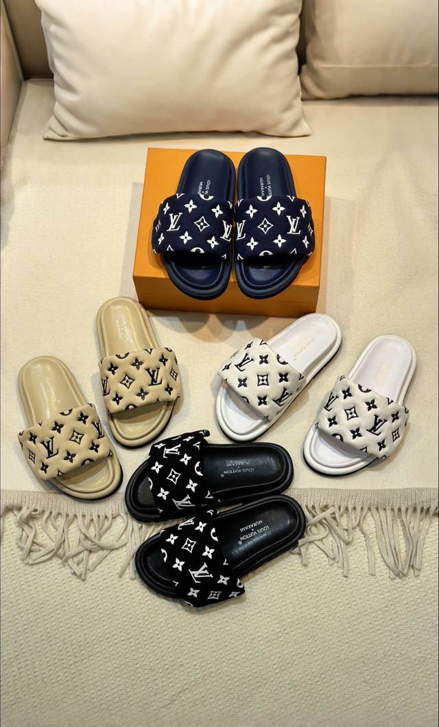 Vuitton Loui .