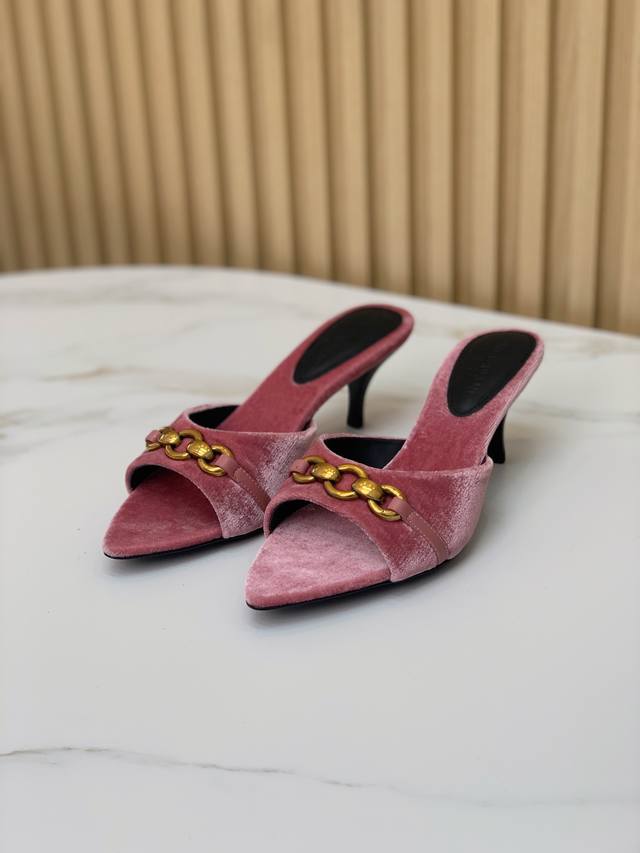 Saint Lauren* high-heeled slippers. A must-have slipper for the elegant little f