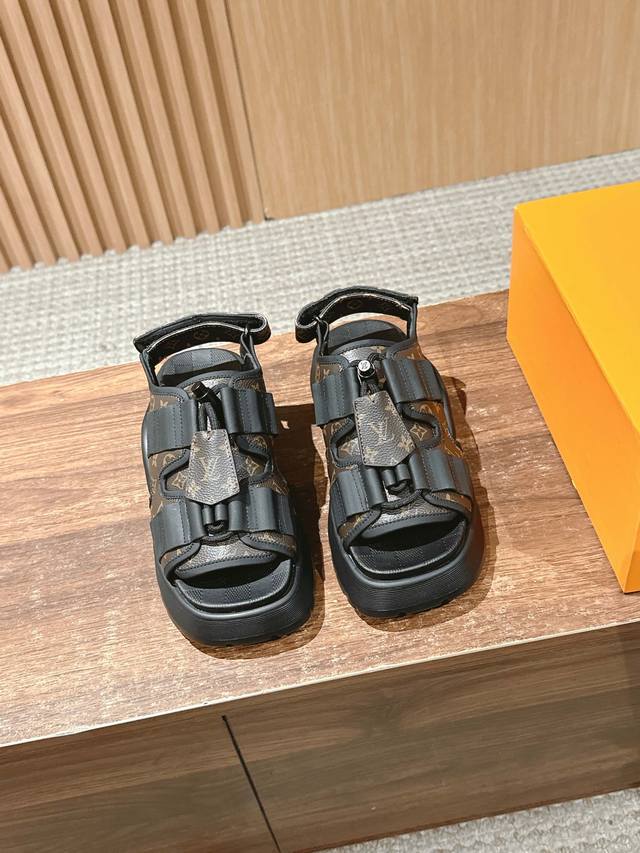 Louis Vuitton's latest Chameleon Velcro sandal combines canvas and suede cowhide