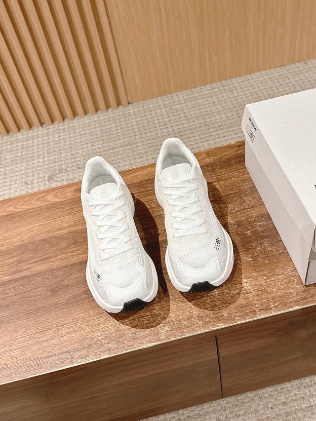 Super nice sneakers from Margiela and Salomon! Who wouldn't like them! A pair of