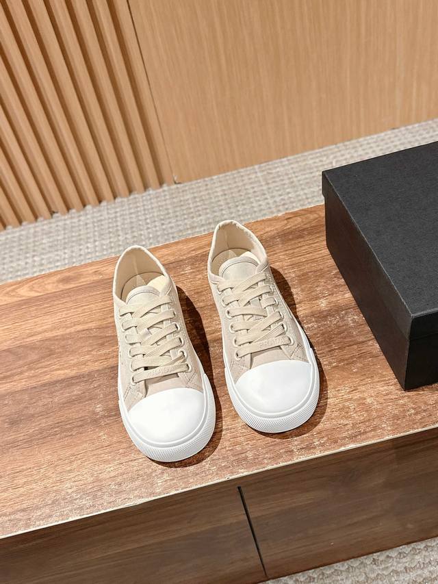 Prada Spring and Summer Canvas Biscuit Shoes After a few years, Prada has brough