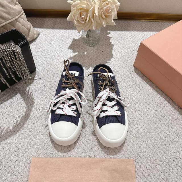 Factory, Miumiu spring and summer catwalk style biscuit shoes closed toe canvas