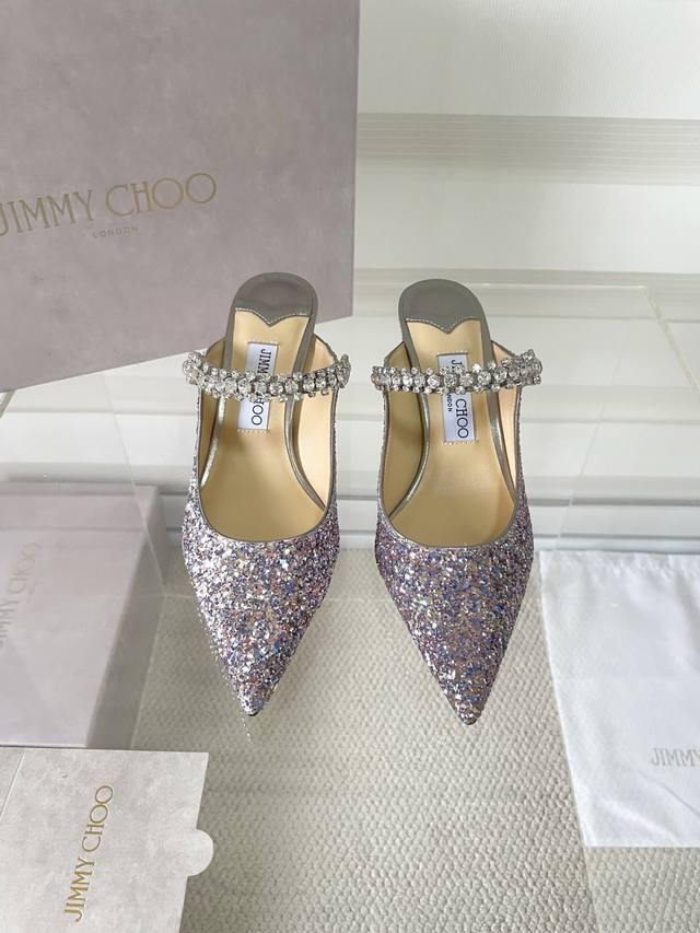 Jimmy Choo Bing series glitter fabric signature mules, modern and stylish. Elega