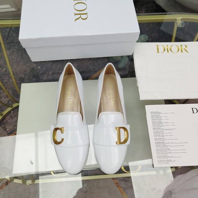 New patent leather flat sandals from the counter. This C'Est Dior sandal is a ne