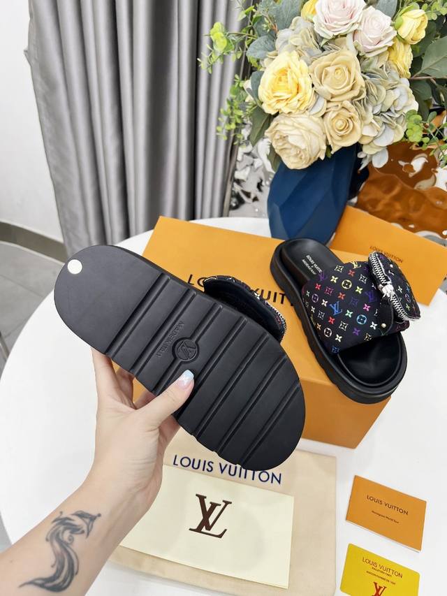 Lv brand L's popular embossed logo sandals. This Pool Pillow Comfort flat sandal