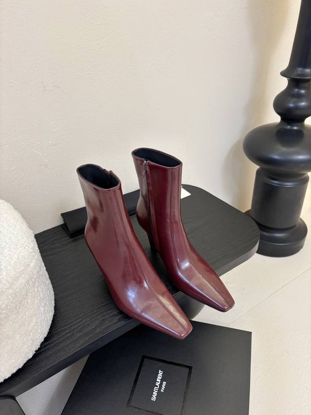Saint Laurent short boots The pointed toe and stiletto heel complement each othe