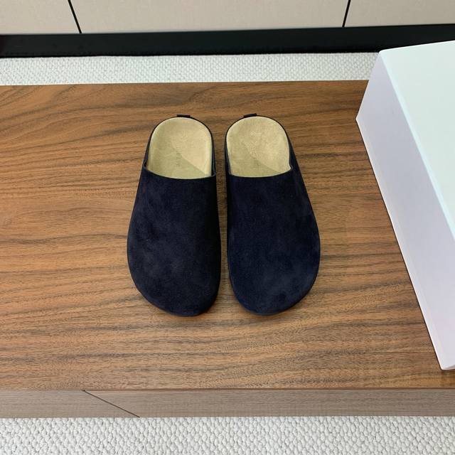 The Row closed toe slippers. A little retro, looks good with any outfit! The who