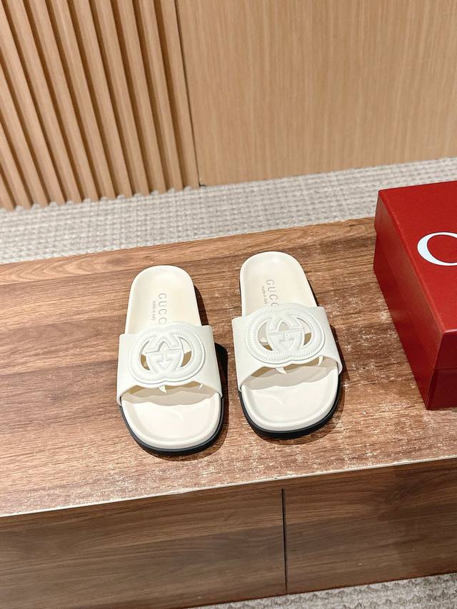 Top version of Gucci's new Velcro beach slippers, diamond G buckle leather slip