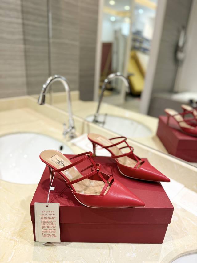 Valentino new latest micro-heeled mules. Platinum-plated mini rivets and sexy po