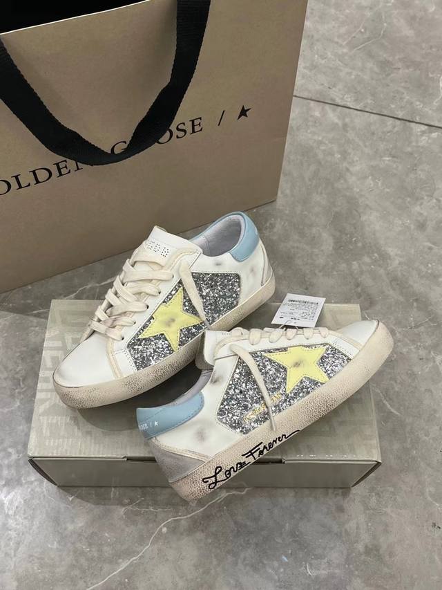 Letter bottom blue tail yellow star couple style. Purchase the original replica