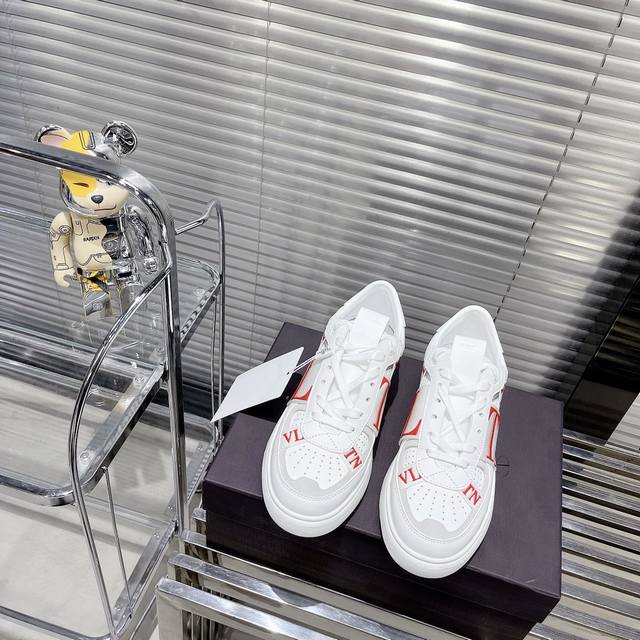 impulse price: Valentino One Stud calfskin lace-up sneakers. Soft sheepskin low-