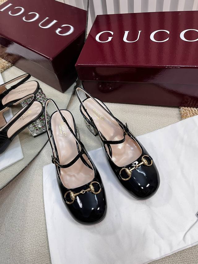 G's new Gucci horsebit slingback sandals with thick heels and patent leather san