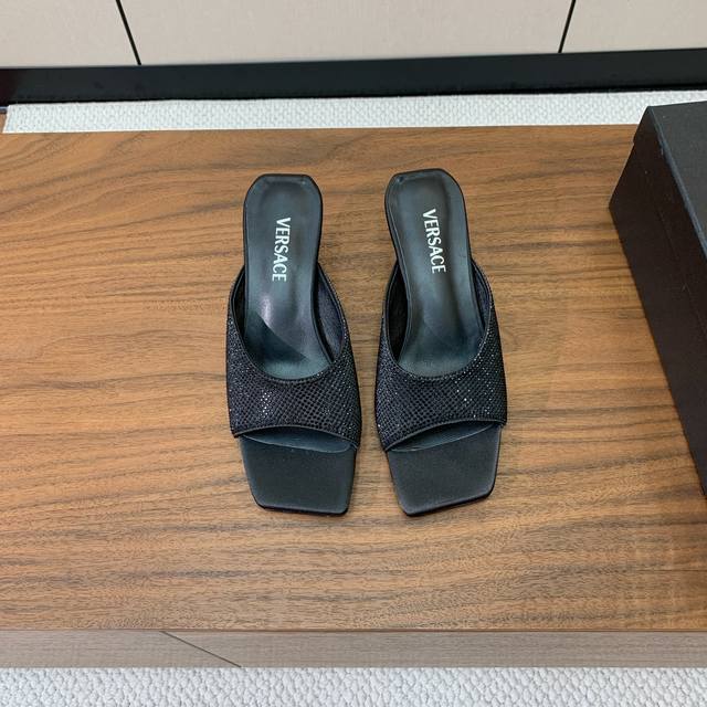 Versace metal heel slippers. Very strong Italian style. Silk upper with hot diam