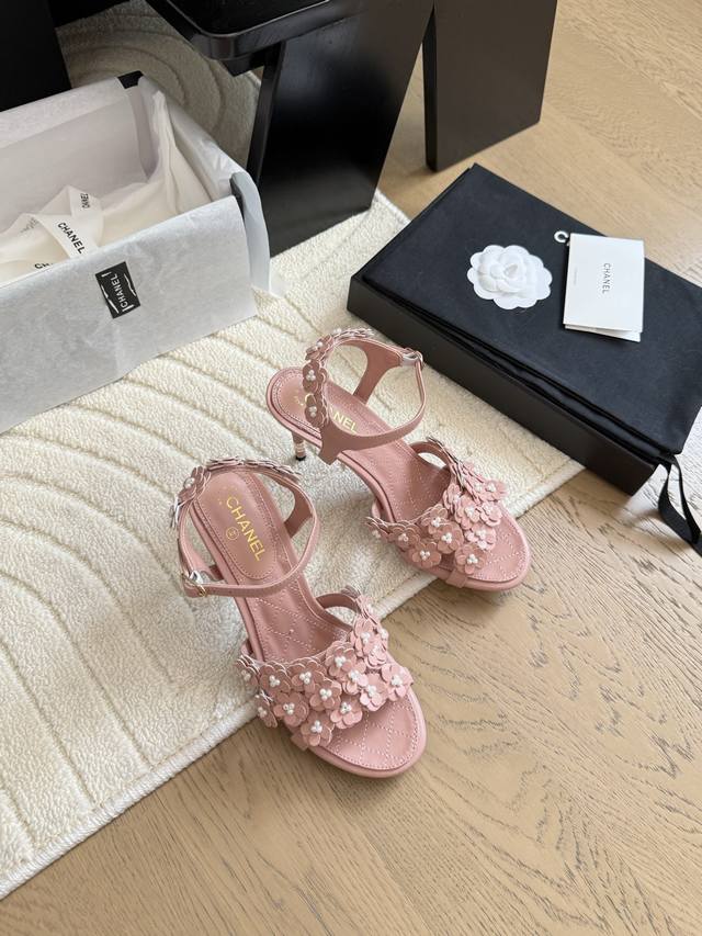 Chanel 25P New Camellia Sandals Each of the delicate flowers is decorated with a