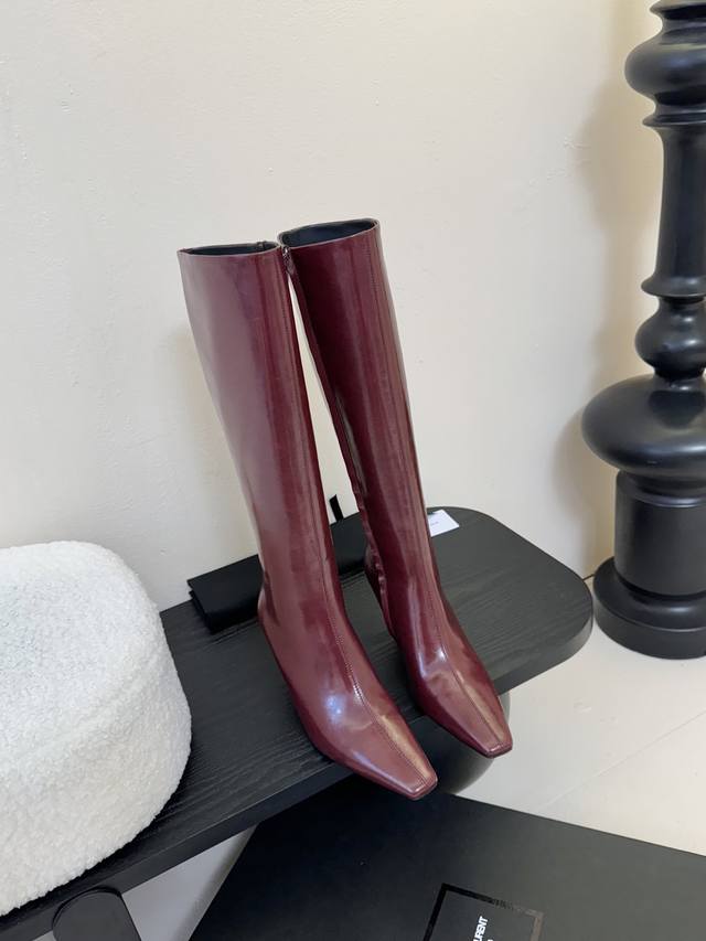 Saint Laurent boots The pointed toe and stiletto heel complement each other, ad