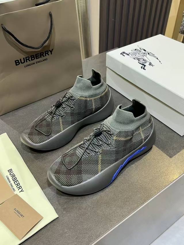 Made in Italy sneaker with breathable Burberry check knit sock upper. Leather l