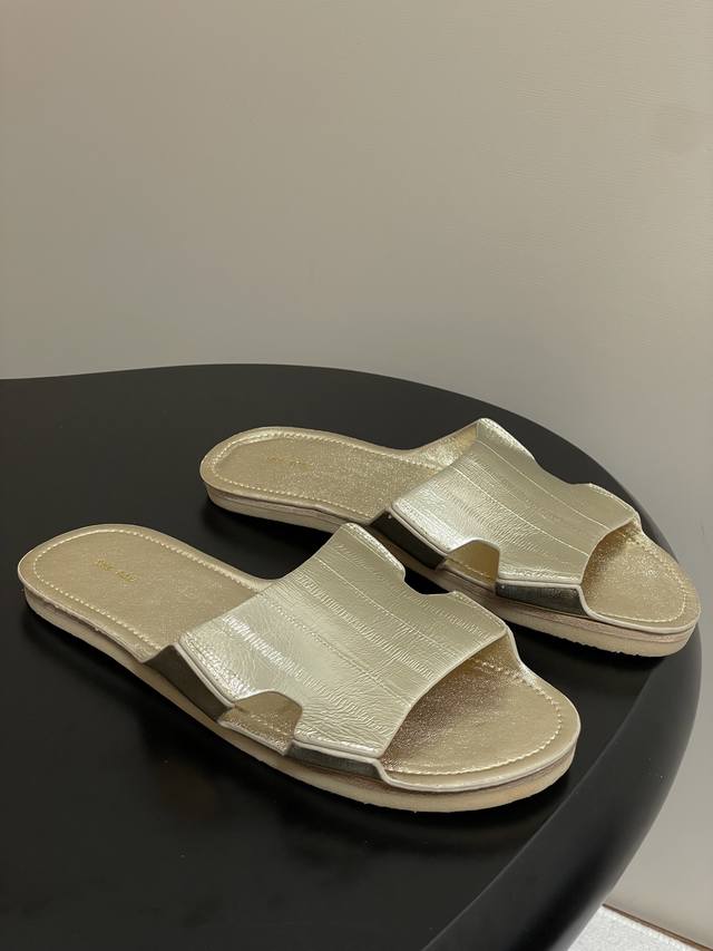 The Row 25 Summer new Tr simple eel pattern flat slippers The ceiling of spring